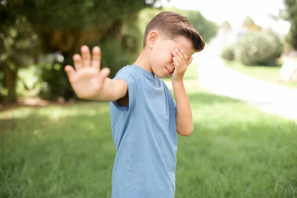 Beautiful Caucasian Little Kid Boy Wearing Blue Shirt Standing Outdoors — Stock Photo, Image