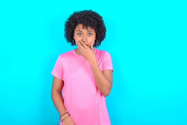 Emotional Young African American Woman Wearing Pink Shirt Blue Background — Stockfoto