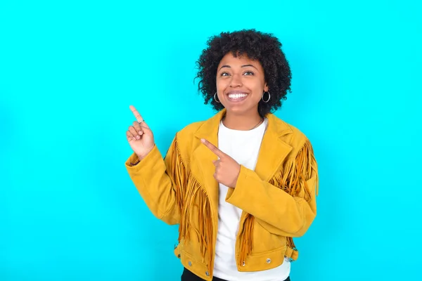 Young African American Woman Wearing Yellow Fringe Jacket Blue Background — 图库照片