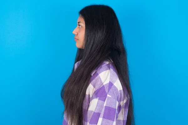 Young Latin Woman Wearing Plaid Shirt Blue Background Looking Side — 스톡 사진
