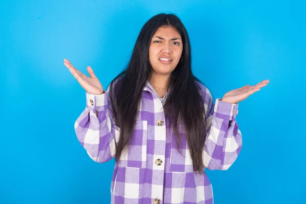 Indignant Young Latin Woman Wearing Plaid Shirt Blue Background Gestures — Stock Fotó