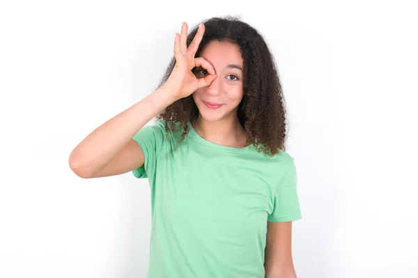 Teenager Girl Afro Hairstyle Wearing Green Shirt White Background Doing — Stockfoto