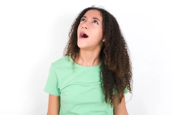 Teenager Girl Afro Hairstyle Wearing White Shirt Green Background Angry — 스톡 사진
