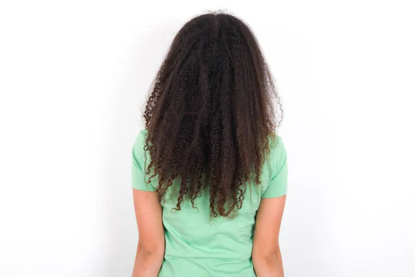 Back View Teenager Girl Afro Hairstyle Wearing White Shirt Green — стоковое фото