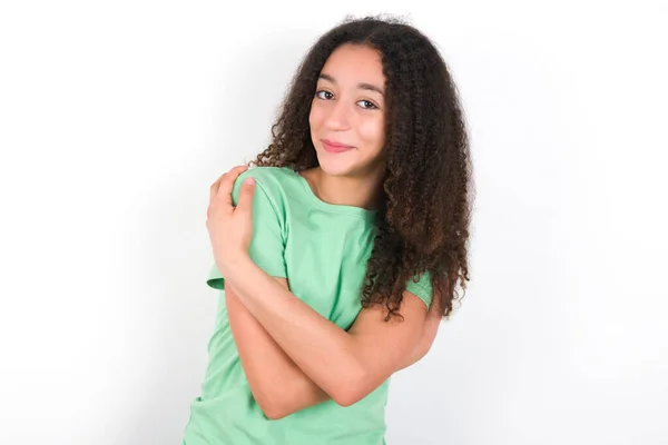Charming Pleased Teenager Girl Afro Hairstyle Wearing White Shirt Green — Zdjęcie stockowe