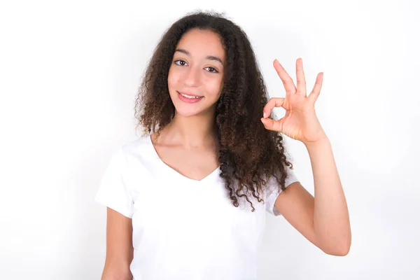 Teenager Girl Afro Hairstyle Wearing White Shirt White Background Hold — Fotografia de Stock