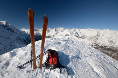 On the mountain peak by ski touring