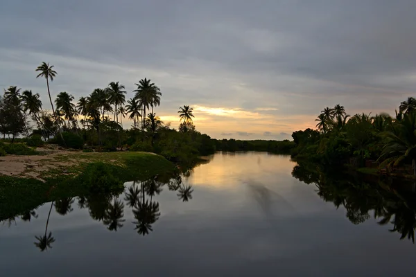 Solnedgång på backwaters — Stockfoto