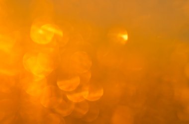 Sarı altın arka plan ışık bokeh ile