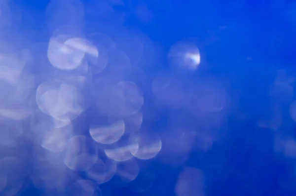 Fondo azul con luz bokeh — Foto de Stock