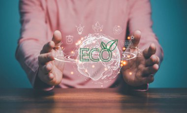 Çevre dostu, insan eli Global 'i tutuyor, Dünya Günü. Enerji tasarrufu, Yeşil Enerji kavramı.