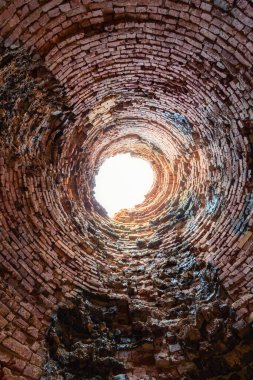 Old brick lime kilns inside view. High quality photo