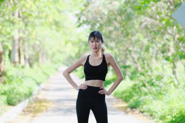 young Asian beautiful woman at workout outdoors 