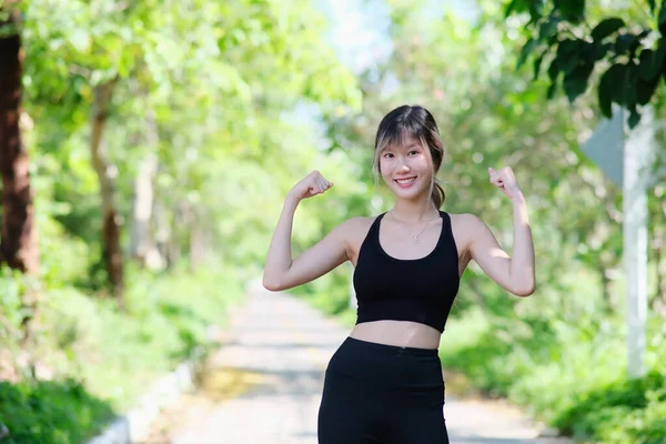Young Asian Beautiful Woman Workout Outdoors — стоковое фото