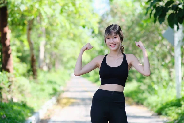 Young Asian Beautiful Woman Workout Outdoors — стоковое фото