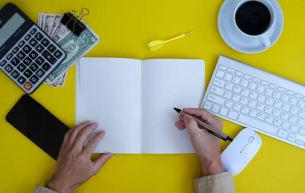 top view of male hands working on keyboard, office supplies 
