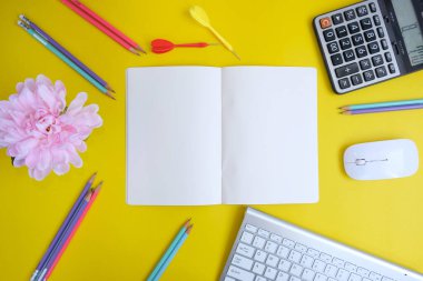 colorful background with stationary items and darts 