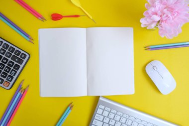 colorful background with stationary items and darts 