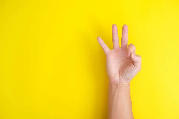 Hand Gesture Yellow Background — Photo