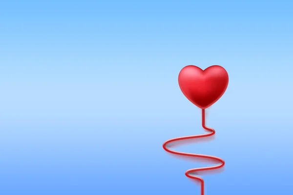 red heart shaped balloon on blue background. valentine\'s day.