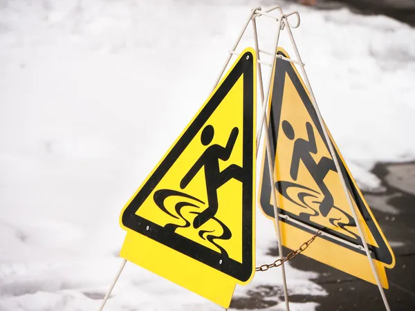 Caution slippery surface sign — Stock Photo, Image