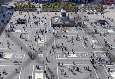 MILAN, ITALY, APRIL 7, 2022 - Aerial view of Duomo Square from roof of the famous Cathedral Duomo of Milan, Italy