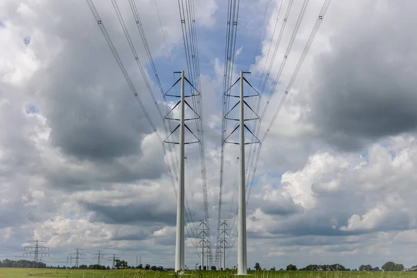 Expansion High Voltage Grid Many High Voltage Pylons Meet Growing — Stock Photo, Image