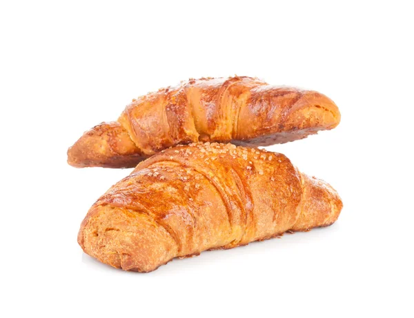 Croissants recém-assados em um fundo branco — Fotografia de Stock
