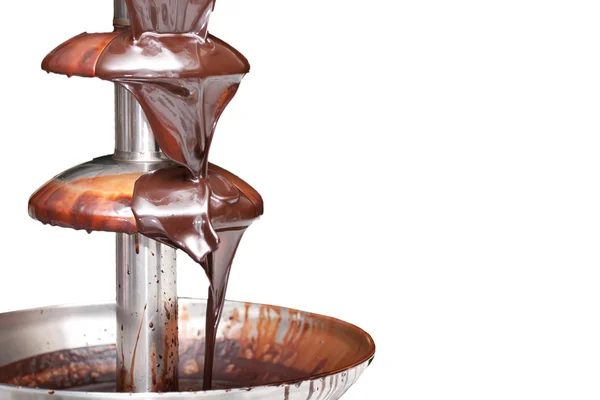 Chocolate fountain on white background — Stock Photo, Image