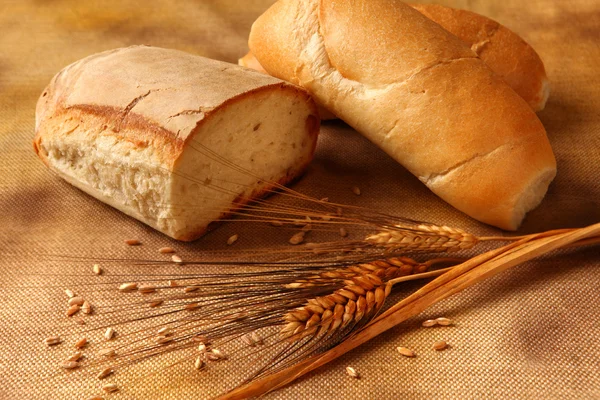 Bread rye spikelets on an old background — Stock Photo, Image