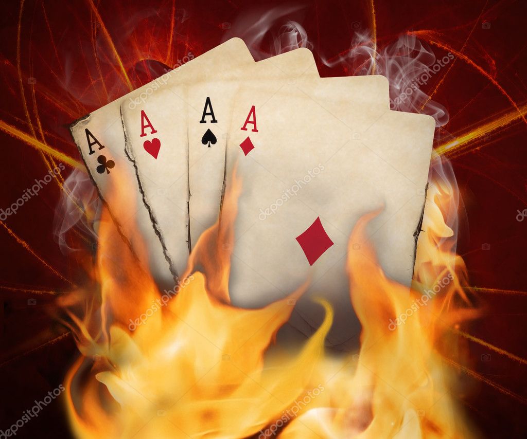 Poker cards burn in the fire Stock Photo by ©AntonioGravante 25344349