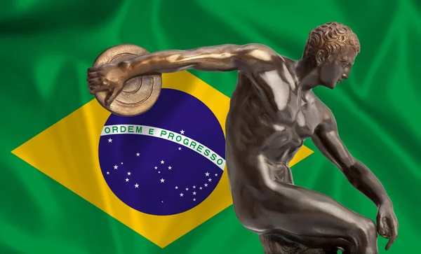 Discus thrower on Brazilian flag — Stock Photo, Image