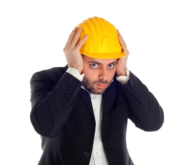 Frightened businessman with construction helmet — Stock Photo, Image