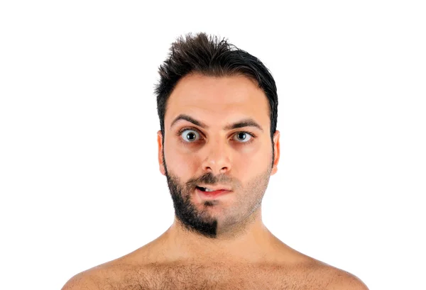 A young man with a beard on half of the face — Stock Photo, Image