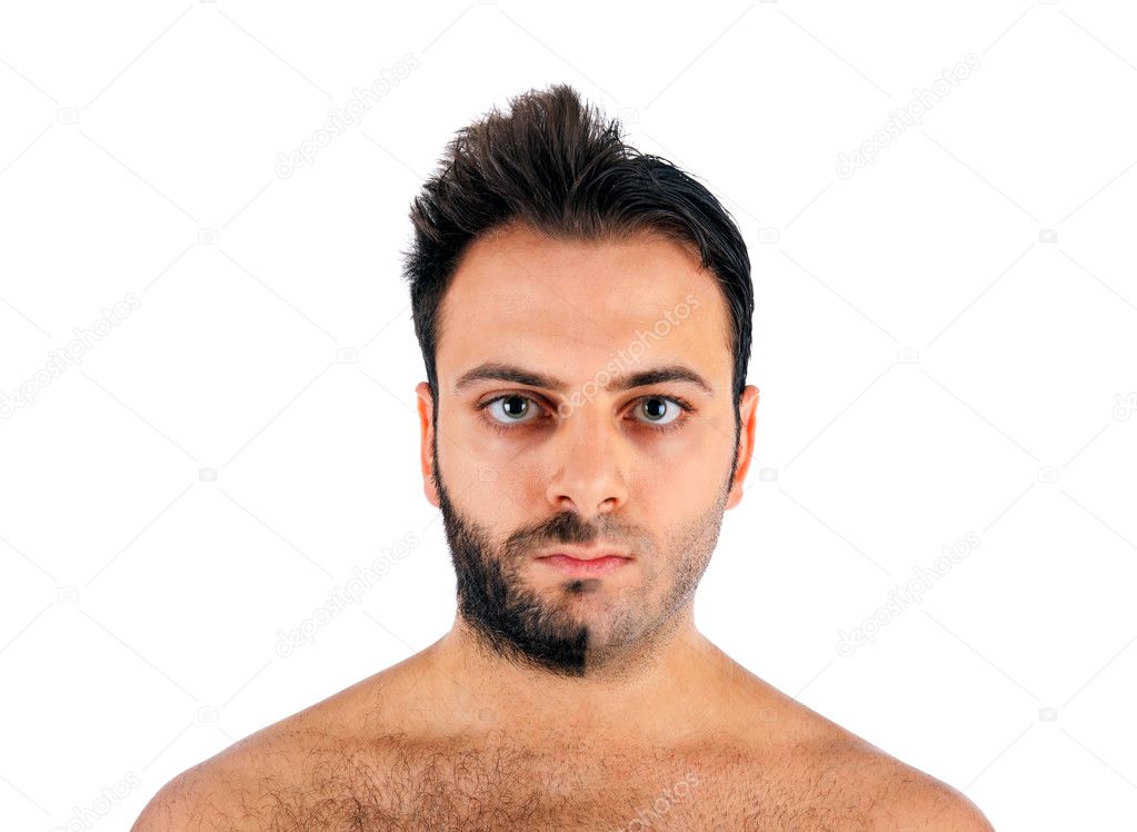 A young man with a beard on half of the face