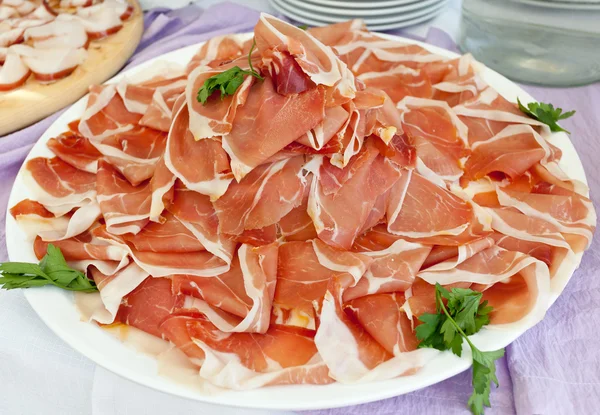 Plate with slices of ham — Stock Photo, Image