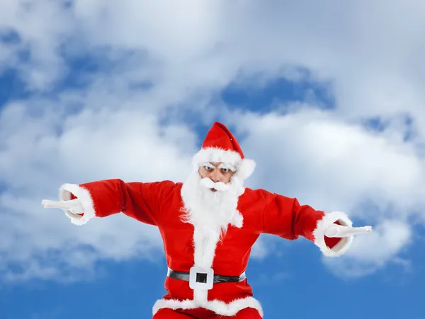 Babbo Natale imita un aereo mentre vola — Foto Stock