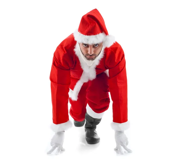 Santa Claus in the starting position on white background — Stock Photo, Image