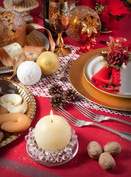 Christmas table near the fireplace — Stock Photo, Image