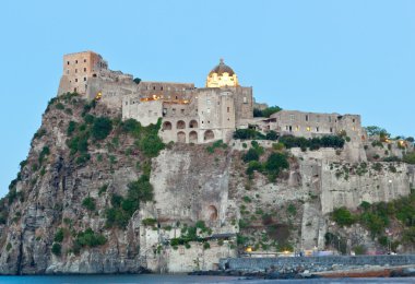 Aragonese Castle in Ischia island by night clipart