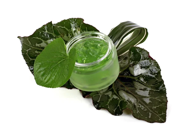 Cosmetics cream in the green jar — Stock Photo, Image