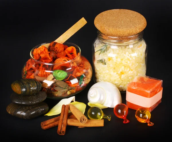 Accessories for spa with salt bath, cinnamon and stones — Stock Photo, Image