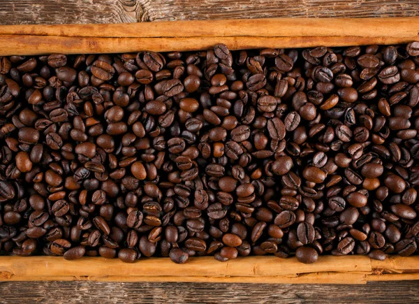 Marco con granos de café y canela de ceilán — Foto de Stock