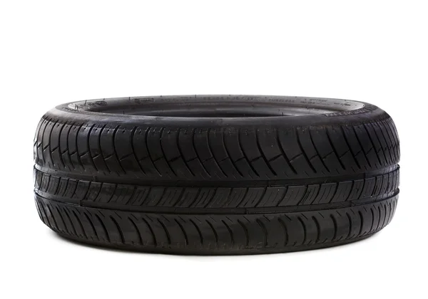 Použité pneumatiky na bílém pozadí — Stock fotografie