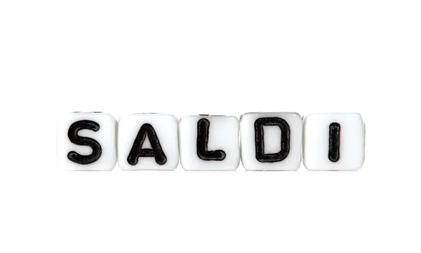 Dobbelstenen met letters vormen woord: saldi — Stockfoto