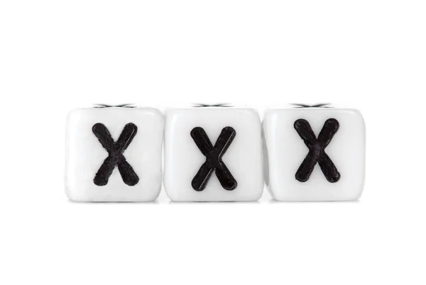 Dados com letras formando palavra: xxx — Fotografia de Stock