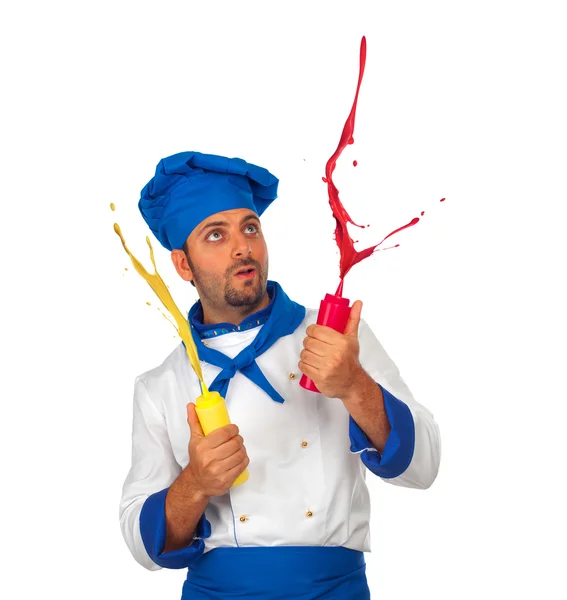 Chef brinca com ketchup e maionese — Fotografia de Stock