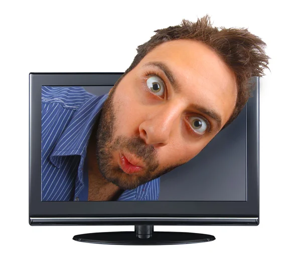 Мальчик с удивленным выражением лица в телевизоре — стоковое фото