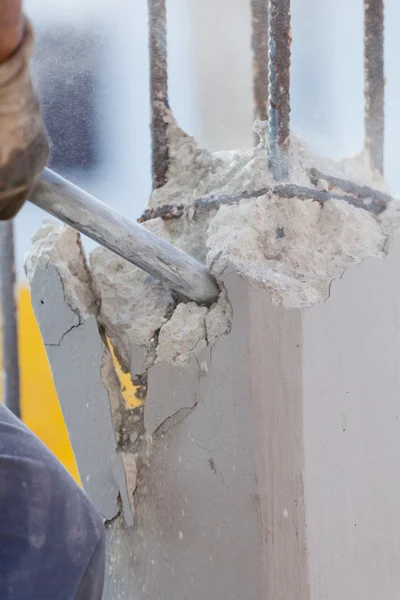 Breaking reinforced concrete with jackhammer — Stock Photo, Image