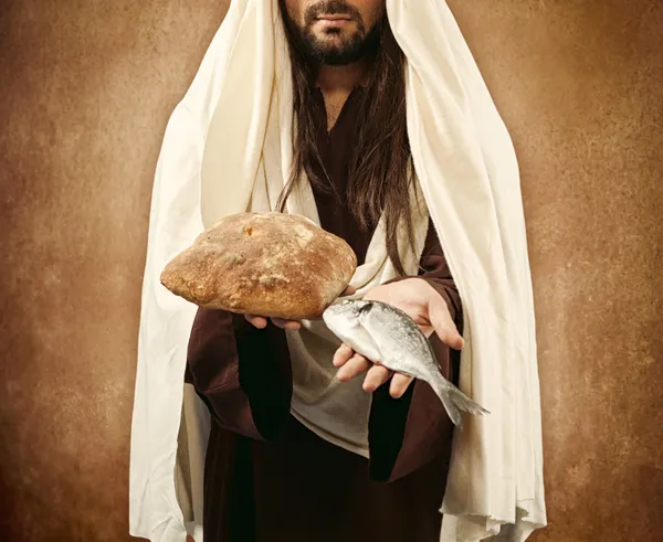 Jésus donne du pain et du poisson — Photo